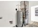 Well-maintained utility room with a water heater and modern HVAC system for efficient home comfort at 11904 Vale St, Indianapolis, IN 46235