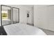 Open bedroom design showcasing a large mirror and an open doorway to the ensuite bathroom at 11916 Vale St, Indianapolis, IN 46235