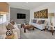 Inviting living room with modern furniture, stylish decor, and a cozy atmosphere at 11916 Vale St, Indianapolis, IN 46235