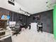 Well-equipped studio space with acoustic panels, multiple monitors, and professional lighting at 12 Windridge St, Country Club Heights, IN 46011