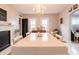 Bright dining room features hardwood floors and modern lighting at 1207 Chestnut St, Columbus, IN 47201