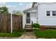 Charming home exterior showcasing a well-kept walkway, steps, and minimal landscaping at 1207 Chestnut St, Columbus, IN 47201