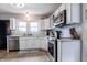 Modern kitchen with stainless steel appliances and ample counter space at 1207 Chestnut St, Columbus, IN 47201