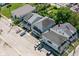Aerial view of homes and buildings in a city neighborhood with street parking at 1212 S Senate Ave, Indianapolis, IN 46225