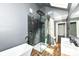 Modern bathroom with double sinks, a luxurious soaking tub, and a glass shower at 1212 S Senate Ave, Indianapolis, IN 46225