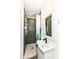 Modern bathroom features sleek shower with rainfall shower head and sink with vanity at 1212 S Senate Ave, Indianapolis, IN 46225