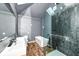 Modern bathroom with double sinks, a luxurious soaking tub, and a glass shower at 1212 S Senate Ave, Indianapolis, IN 46225