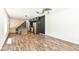 Open-concept kitchen featuring a unique island, stainless steel appliances and laminate floors at 1212 S Senate Ave, Indianapolis, IN 46225