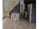 Contemporary kitchen with stainless steel appliances, a wooden island and modern fixtures at 1212 S Senate Ave, Indianapolis, IN 46225