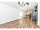 Open-concept kitchen featuring stainless steel appliances, an island and laminate floors at 1212 S Senate Ave, Indianapolis, IN 46225