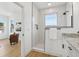 Contemporary bathroom featuring a walk-in shower, granite vanity, and bright natural light at 1231 Marlowe Ave, Indianapolis, IN 46202