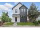 Charming two-story home with a modern design and well-manicured lawn at 1231 Marlowe Ave, Indianapolis, IN 46202