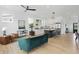 Bright open living space featuring a modern kitchen with stainless steel appliances and island at 1231 Marlowe Ave, Indianapolis, IN 46202