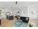 Spacious and open concept living area flowing seamlessly into the modern kitchen and dining space at 1231 Marlowe Ave, Indianapolis, IN 46202