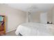 Cozy bedroom with neutral tones, featuring a ceiling fan and carpet flooring for a relaxing atmosphere at 12422 River Valley Dr, Fishers, IN 46037