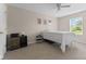 Bedroom featuring neutral walls, carpet, a window with blinds, and a side table with decorative art at 12422 River Valley Dr, Fishers, IN 46037
