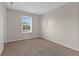 Bedroom with neutral walls, carpet, a double-hung window with blinds, and a standard baseboard trim at 12422 River Valley Dr, Fishers, IN 46037