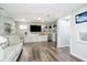 Finished basement featuring neutral color palette, great flooring, tv and lots of storage at 14130 Autumn Woods Dr, Carmel, IN 46074