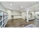 Finished basement with durable flooring, built-in shelving, and great room to hang out at 14130 Autumn Woods Dr, Carmel, IN 46074