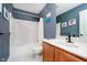 Bathroom featuring a tub and shower, sleek vanity, and modern fixtures at 14130 Autumn Woods Dr, Carmel, IN 46074