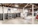 Unfinished basement featuring painted block walls, exposed ceiling and washer and dryer at 1426 N Euclid Ave, Indianapolis, IN 46201