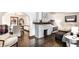 Spacious living room showcasing fireplace, hardwood floors, and an open floor plan at 1426 N Euclid Ave, Indianapolis, IN 46201