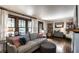 Cozy living room with ample natural light, comfortable sofa, and charming decor at 1426 N Euclid Ave, Indianapolis, IN 46201