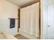 Bathroom features tiled shower with curtain at 1540 N College Ave, Indianapolis, IN 46202