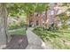 Beautiful brick home with well-maintained lawn and mature shade trees at 1540 N College Ave, Indianapolis, IN 46202