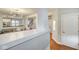 Bright living room featuring hardwood floors, modern lighting, and open layout at 1540 N College Ave, Indianapolis, IN 46202