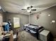 bedroom features unique ceiling fan and decorative light strips and superhero decals at 1570 S Harriet St, Martinsville, IN 46151