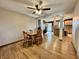 Traditional dining room features hardwood floors and leads to a spacious kitchen at 1570 S Harriet St, Martinsville, IN 46151