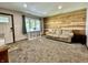 Bright living room showcases a wood accent wall and built-in storage at 1570 S Harriet St, Martinsville, IN 46151
