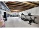 Unfinished basement with exposed ceiling, concrete floor, and workout equipment at 15717 Hush Hickory, Westfield, IN 46074