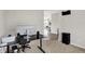 Home office with a black desk and a large monitor, providing a functional workspace for productivity at 15717 Hush Hickory, Westfield, IN 46074