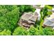 Aerial view of backyard featuring large deck, pergola, and professionally landscaped yard at 1860 Red Fox E Ct, Martinsville, IN 46151
