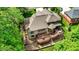 Stunning aerial view of a home showcasing a spacious deck and meticulously landscaped backyard with green trees at 1860 Red Fox E Ct, Martinsville, IN 46151