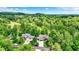 Aerial view of a property showcasing lush greenery, neighborhood, and mountainous view at 1860 Red Fox E Ct, Martinsville, IN 46151