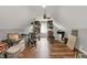 Attic storage space with sloped ceilings and organized shelving at 1860 Red Fox E Ct, Martinsville, IN 46151