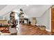 Spacious attic featuring wood floors, a ceiling fan, and ample storage space at 1860 Red Fox E Ct, Martinsville, IN 46151