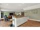 Basement bar and lounge area featuring modern cabinets and lighting at 1860 Red Fox E Ct, Martinsville, IN 46151
