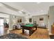 Finished basement featuring a pool table and comfortable seating area at 1860 Red Fox E Ct, Martinsville, IN 46151