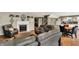 Living room with fireplace and large seating area. adjacent to eat-in kitchen at 1860 Red Fox E Ct, Martinsville, IN 46151