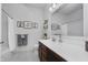 Charming bathroom with shower/tub combo, vanity with solid surface counters, and decorative accents at 18630 Goldwater Rd, Westfield, IN 46062