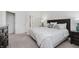 Comfortable bedroom with a stylish headboard and soft carpet at 18630 Goldwater Rd, Westfield, IN 46062