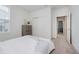 Bright bedroom with a closet, large window, and gray wood furnishings at 18630 Goldwater Rd, Westfield, IN 46062