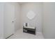 Clean entryway featuring a cozy bench, neutral decor, and tiled floor at 18630 Goldwater Rd, Westfield, IN 46062