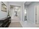 Inviting foyer with neutral walls, tile flooring, and a decorative console table at 18630 Goldwater Rd, Westfield, IN 46062