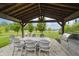 Outdoor kitchen, patio dining, and a beautiful backyard at 18630 Goldwater Rd, Westfield, IN 46062