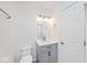 This bathroom features a vanity with storage, and a framed mirror, all under a modern light fixture at 19446 Ethan Allen Ln, Westfield, IN 46074